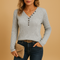Ribbed top with V-neck and button details for women