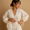V-neck top and shorts with ruffles for women