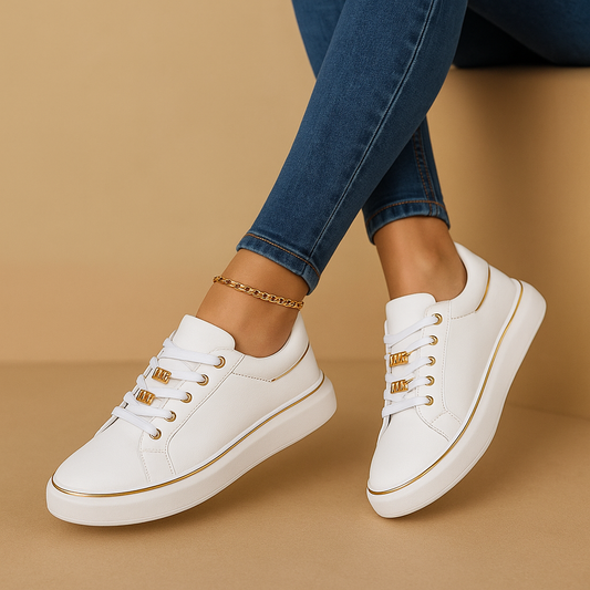 White sneakers with gold detail for women